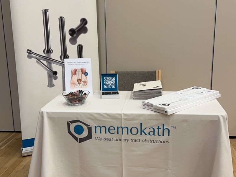 PNN Medical exhibition booth displaying Memokath&trade; stents and informational materials.